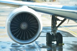 Close up of turbofan engine on commercial aircraft wing