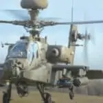 a military-grade helicopter flying in the air